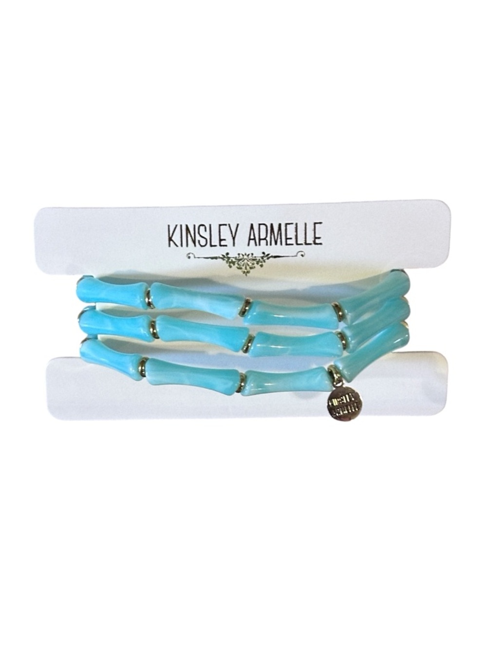 New - Kinsley Armelle set of three light blue, bamboo-style stretch bracelets.
